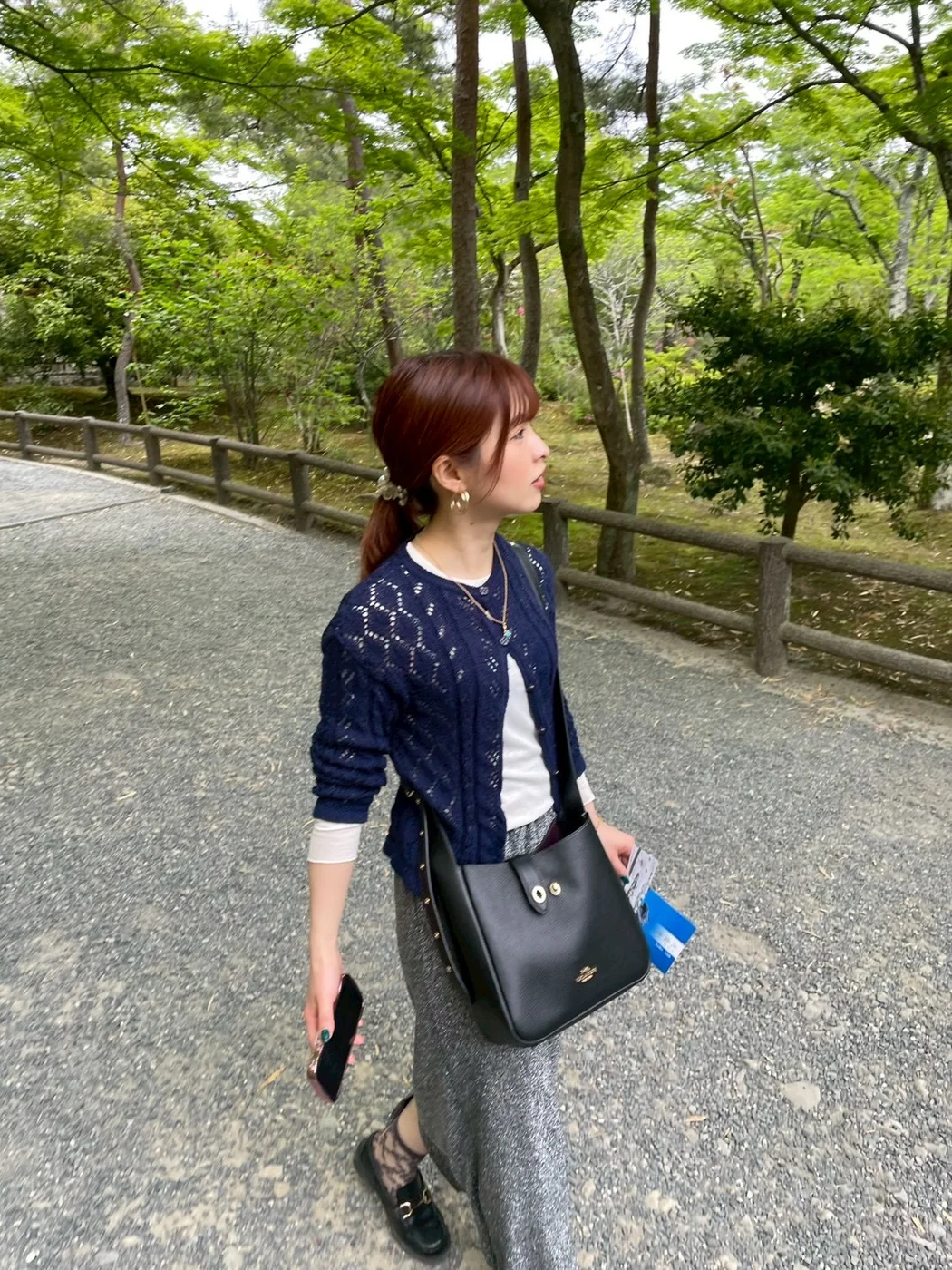 Ayumi walking outdoors in Japan